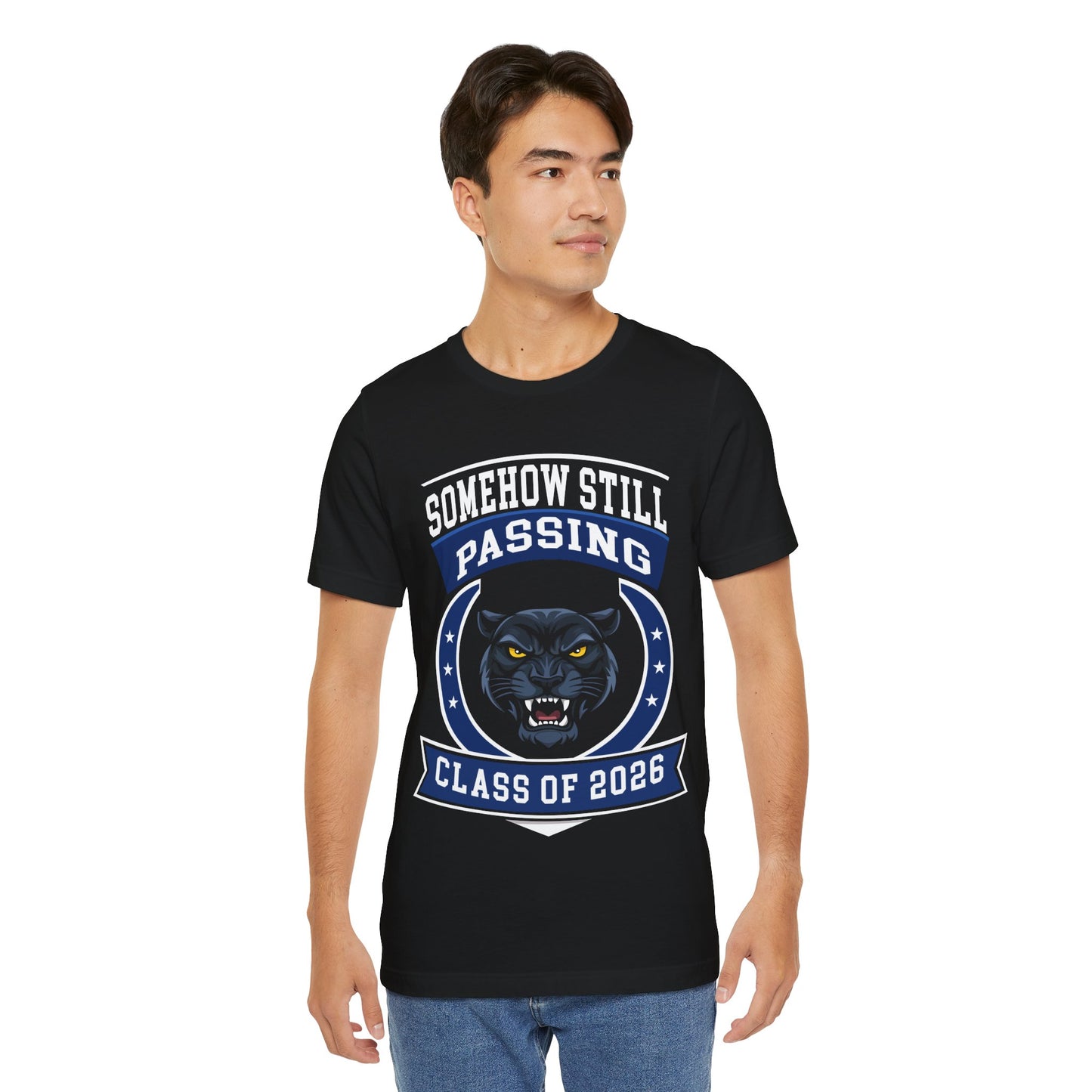 Somehow Still Passing — Funny Senior Panther Tee (Class of 2026)