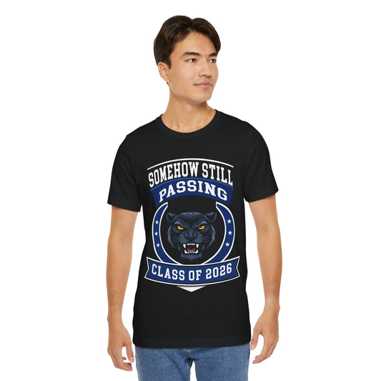 Somehow Still Passing — Funny Senior Panther Tee (Class of 2026)