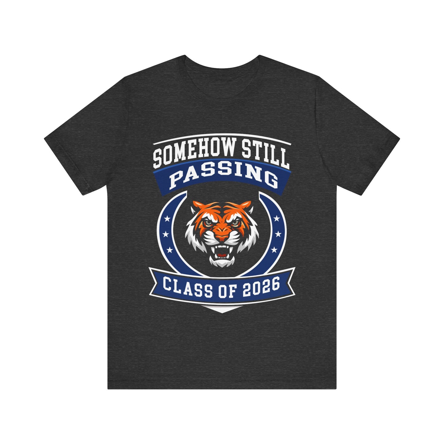 Somehow Still Passing — Funny Senior Tiger Tee (Class of 2026)